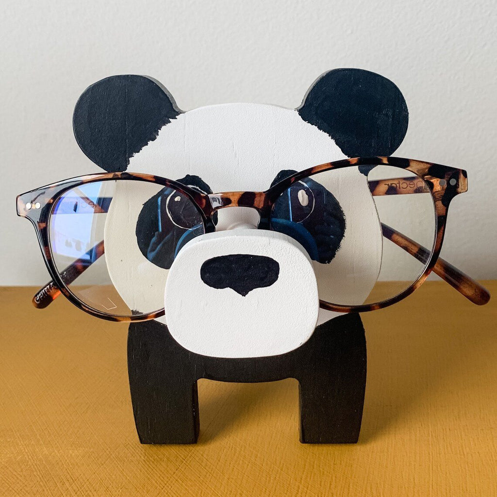 Wooden glasses stand with animals
