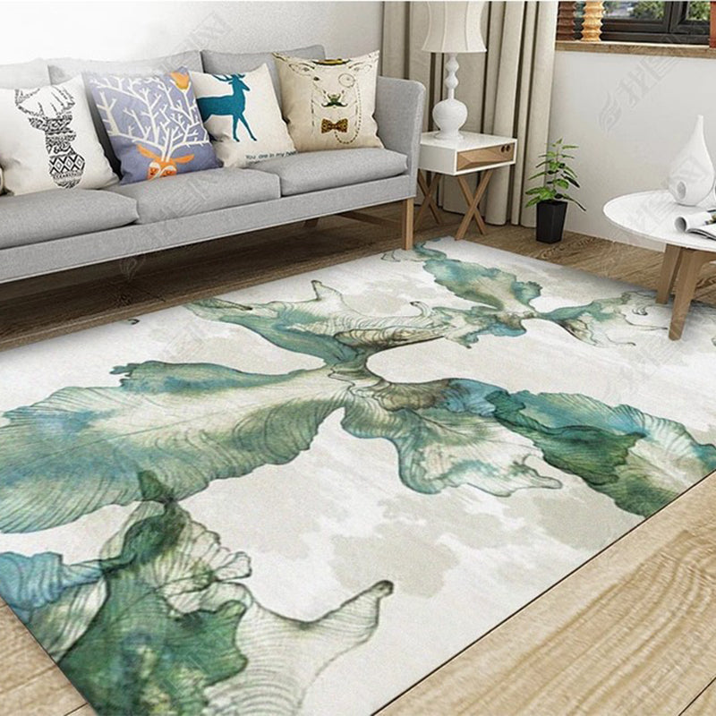 Unique botanical patterned rug with gray and blue leaves, non-slip backing, washable rug for the bedroom