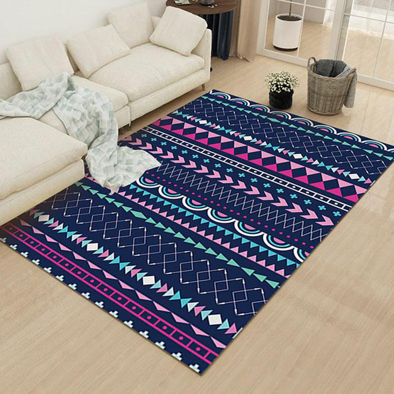 Striped geometric rug with diamond pattern and diamond polyester pet friendly stain resistant indoor mat in blue and purple