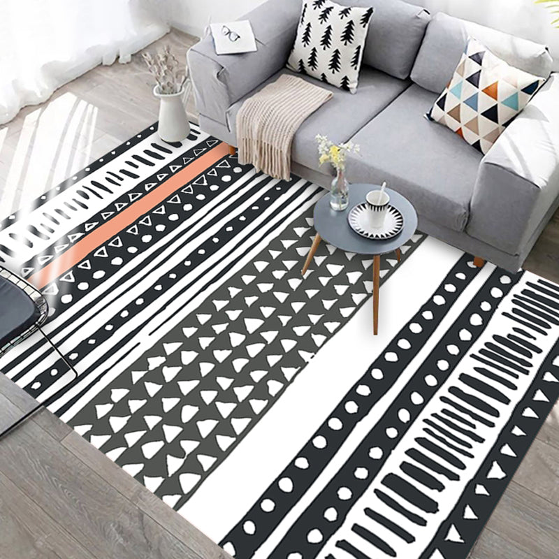 Black and white geometric rug with lines and triangles Southwestern pet-friendly area rug for the living room