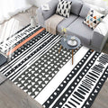 Black and white geometric rug with lines and triangles Southwestern pet-friendly area rug for the living room