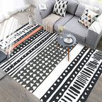 Black and white geometric rug with lines and triangles Southwestern pet-friendly area rug for the living room