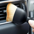 Auto cleaning brush with soft bristles