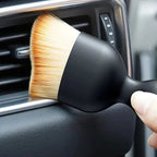 Auto cleaning brush with soft bristles