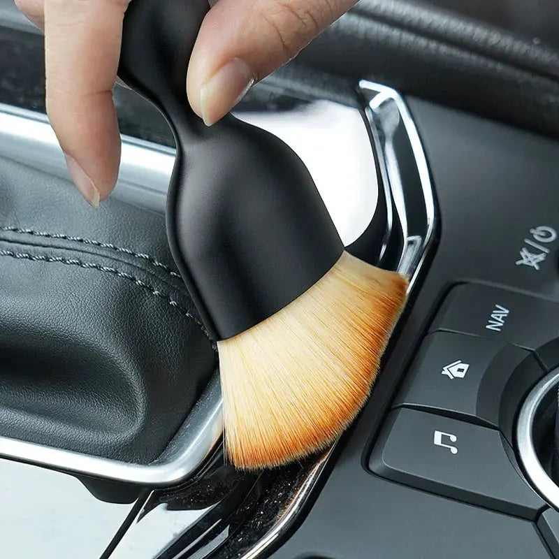 Auto cleaning brush with soft bristles