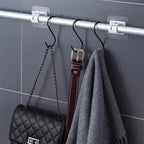 Nail-free, adjustable curtain rod hooks