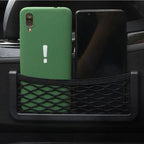 Self-adhesive net bag for the car
