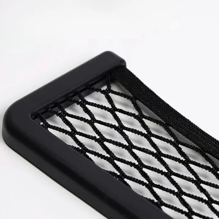 Self-adhesive net bag for the car