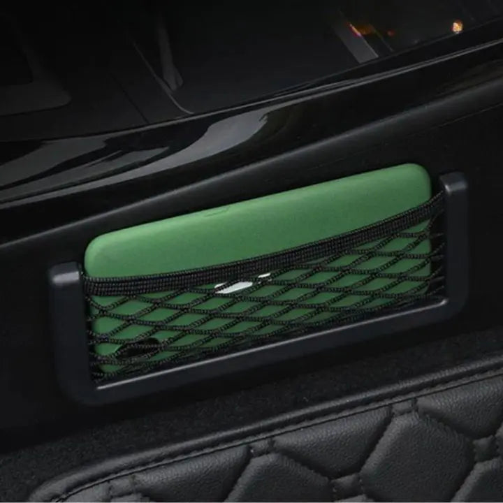 Self-adhesive net bag for the car