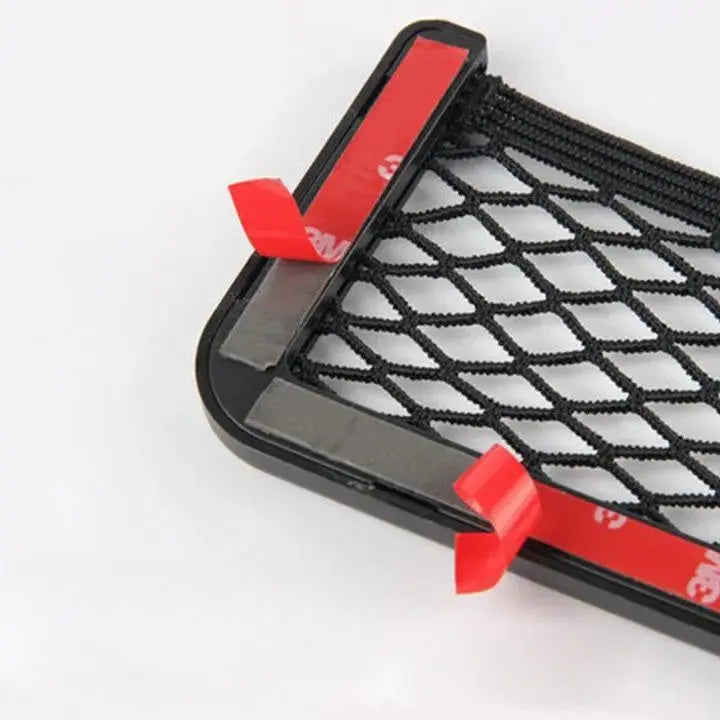 Self-adhesive net bag for the car