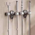 Strong broom holder without drilling – Space-saving & safe storage