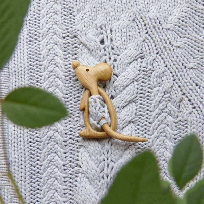 Sweet animal brooch made of wood