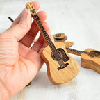 Wooden box for acoustic guitar accessories