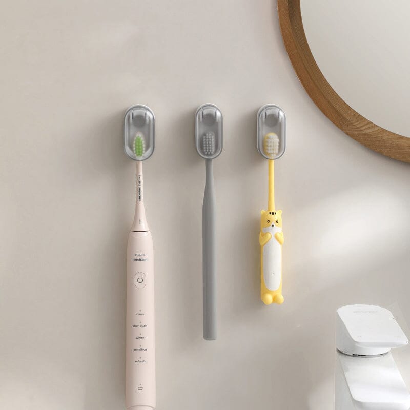 Wall-mounted toothbrush holder with cover
