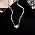 Necklace with magnetic heart pendant