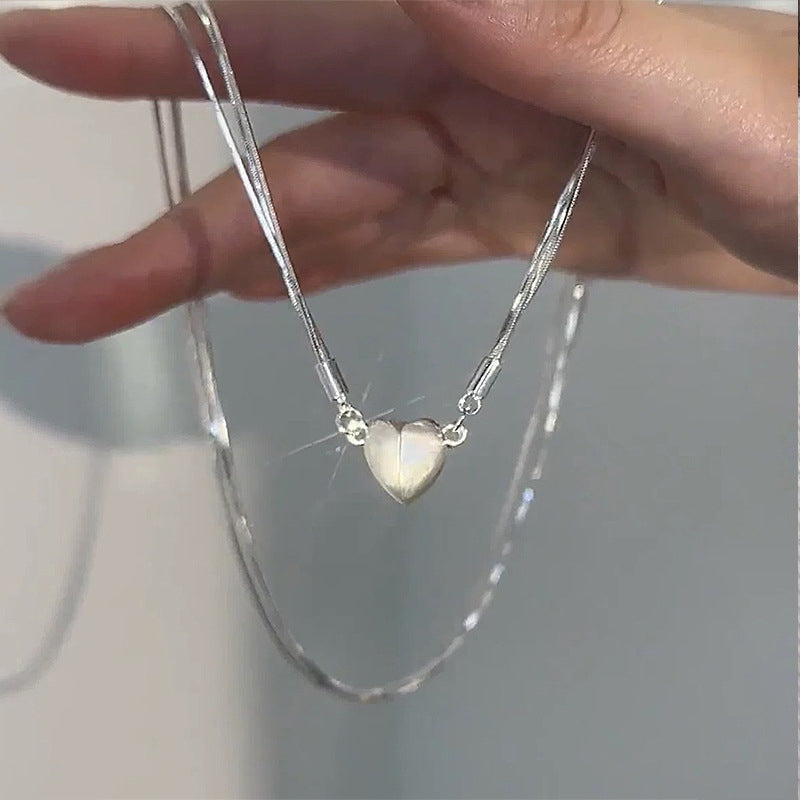 Necklace with magnetic heart pendant