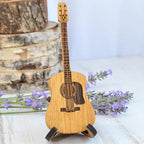 Wooden box for acoustic guitar accessories