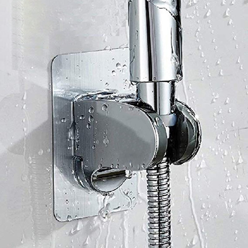 Self-adhesive shower head holder