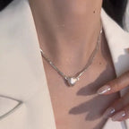 Necklace with magnetic heart pendant