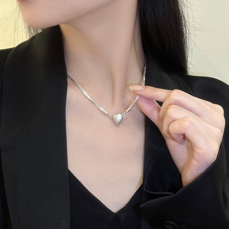 Necklace with magnetic heart pendant