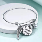 A "Sister is God's Way Of Making Sure We Never Walk Alone" Bangle