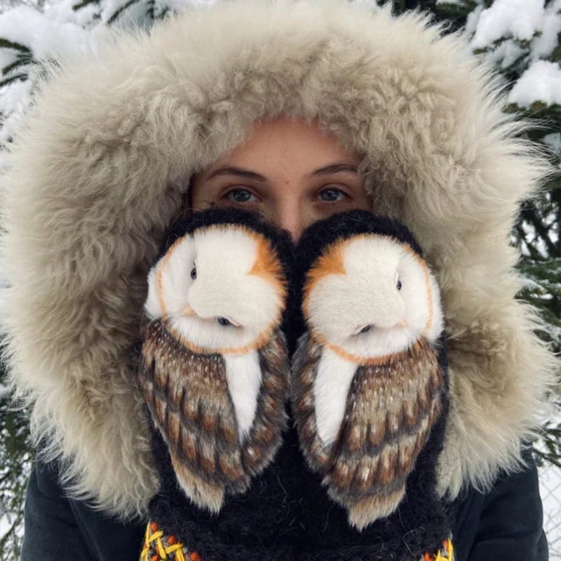 Handknitted Nordic gloves made of wool with owls