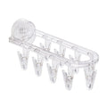 Suction cup collapsible clothes hanger with clip