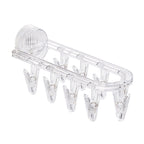 Suction cup collapsible clothes hanger with clip