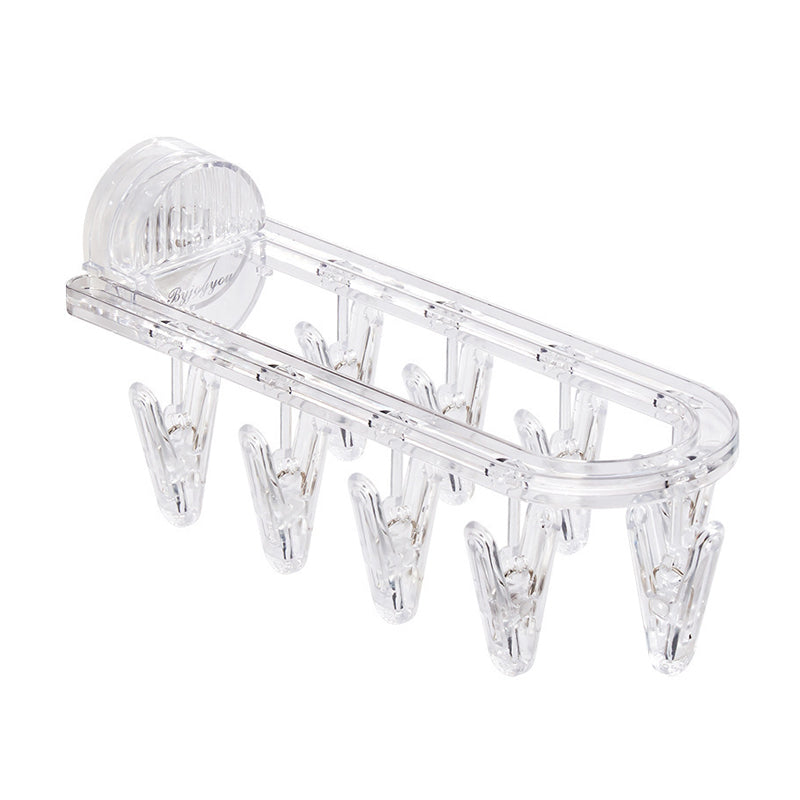 Suction cup collapsible clothes hanger with clip