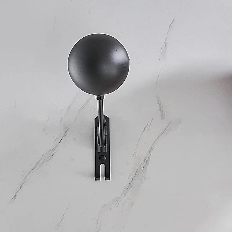 Motorcycle helmet holder