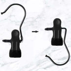 Space-saving portable travel hanger clips