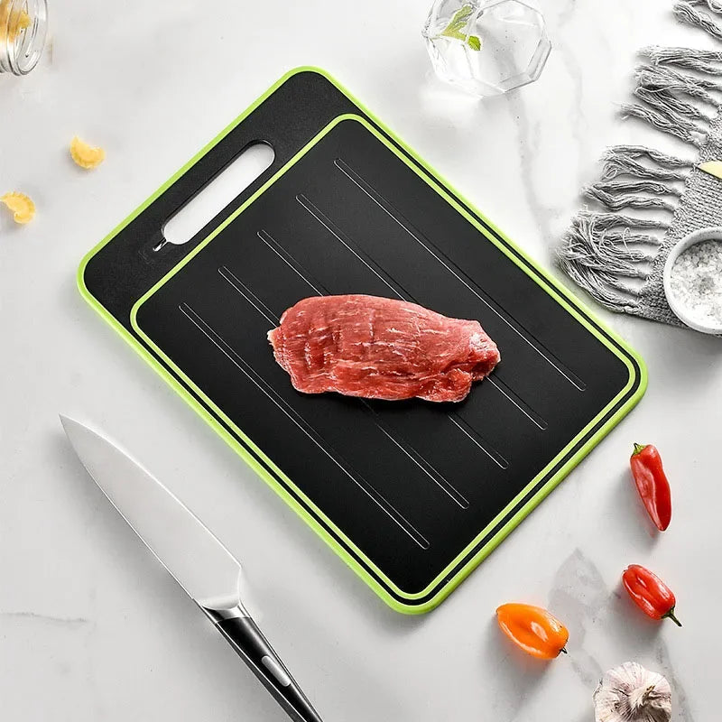 Double-sided cutting board with integrated defrosting plate
