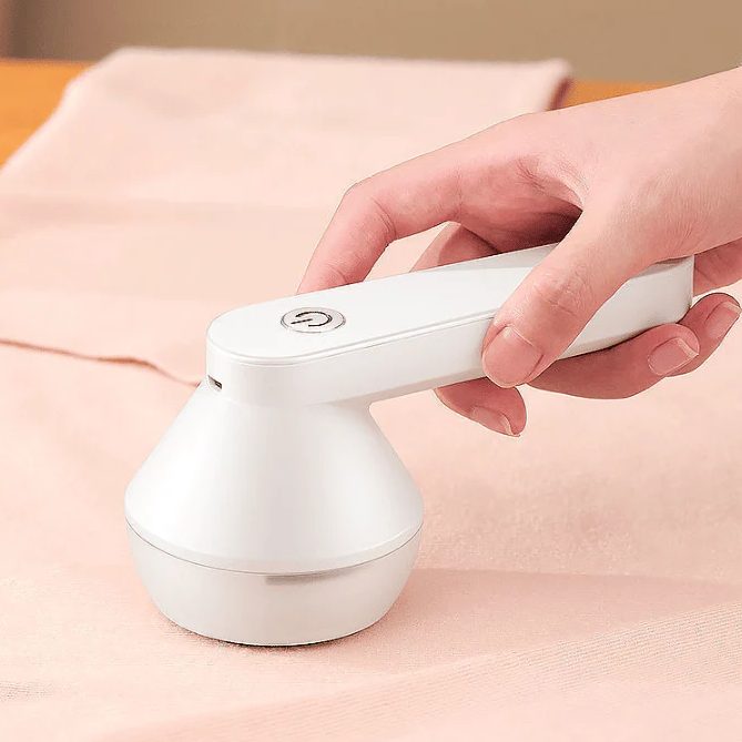 Portable electric lint remover