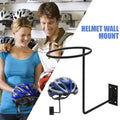 Wall-mounted helmet holder