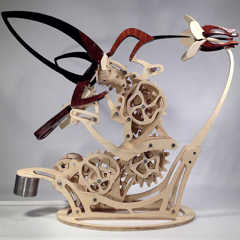 Wood kinetic hummingbird sculpture
