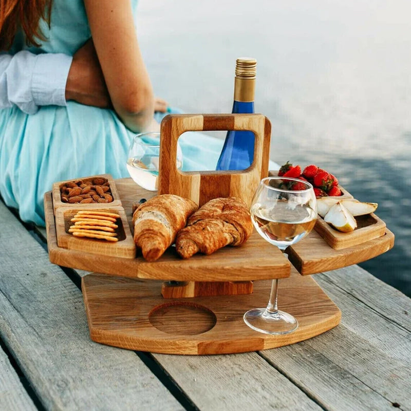 Compact picnic table with wooden bottle holder