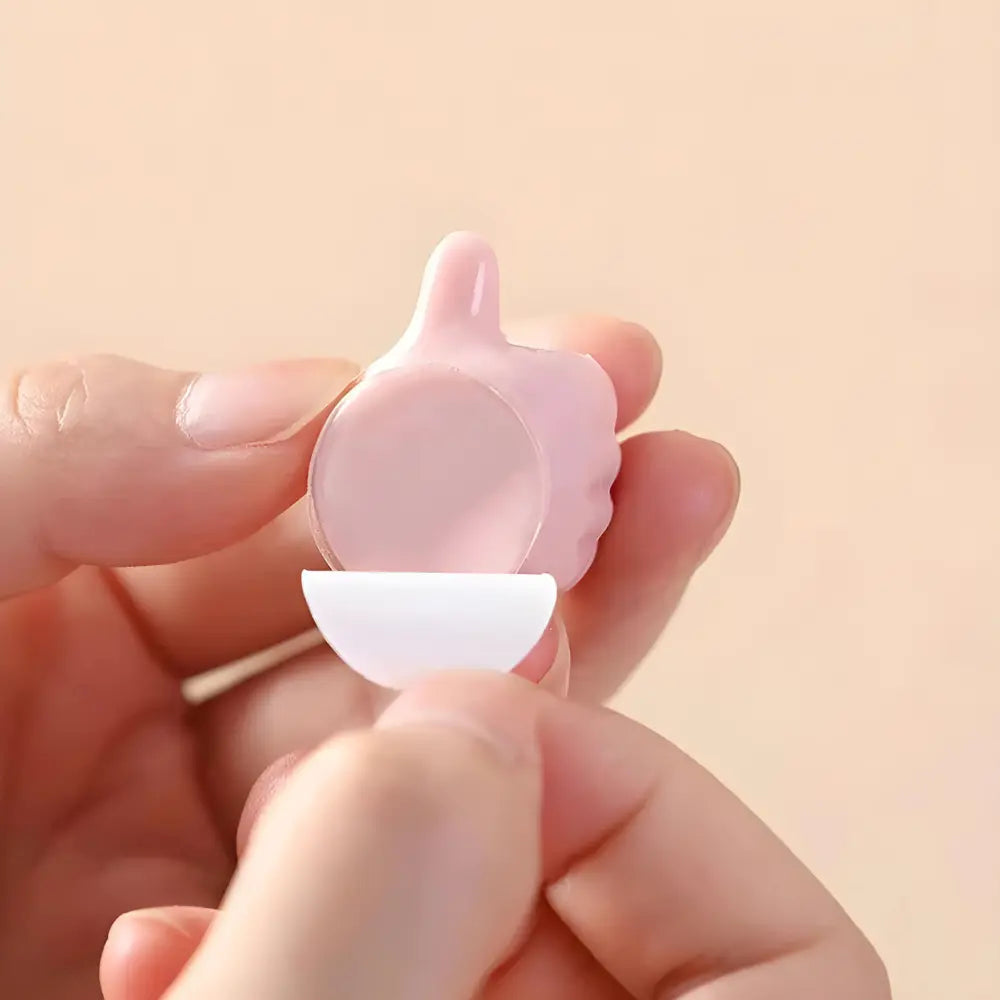 20+20 | Self-adhesive thumb hooks