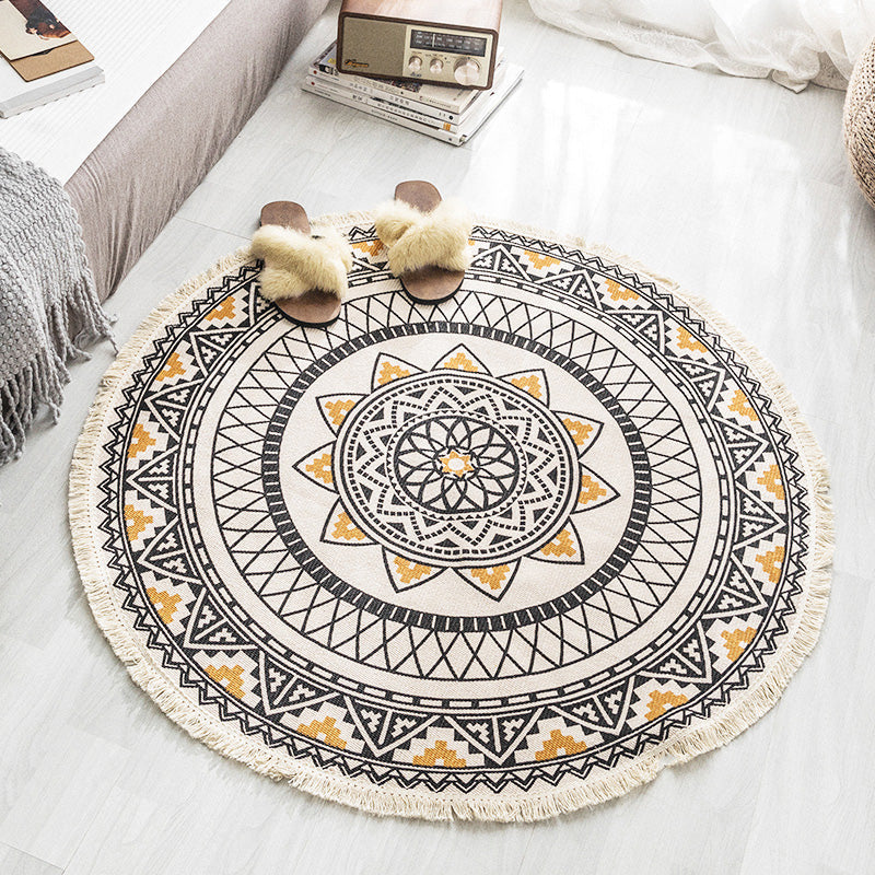 Multicolored, tribal patterned rug made of cotton blend, ethnic rug, easy to care for, hand-woven rug with tassels for the bedroom