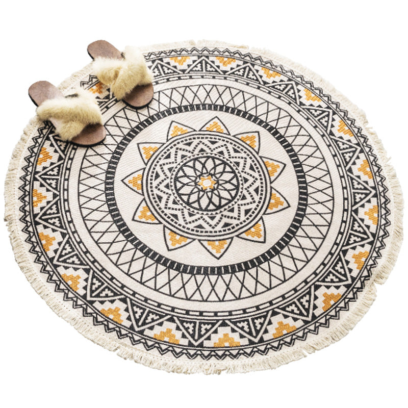Multicolored, tribal patterned rug made of cotton blend, ethnic rug, easy to care for, hand-woven rug with tassels for the bedroom