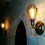 One-bulb wall-mounted light industrial pear cage iron wall light fixture in black