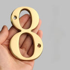 Traditional house numbers made of solid brass