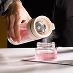 Double-walled glass bottle with tea strainer and infuser