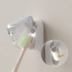 Wall-mounted toothbrush holder with cover