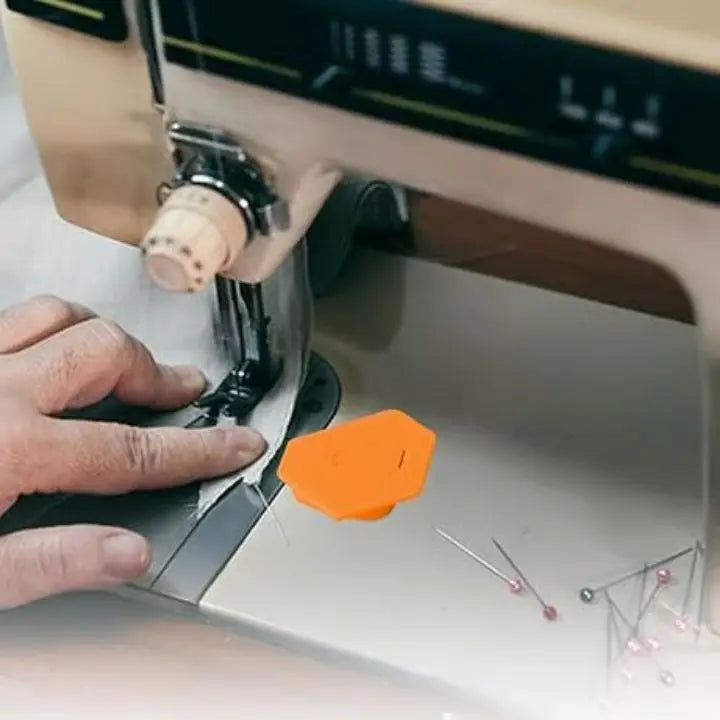Magnetic seam guide for sewing machine