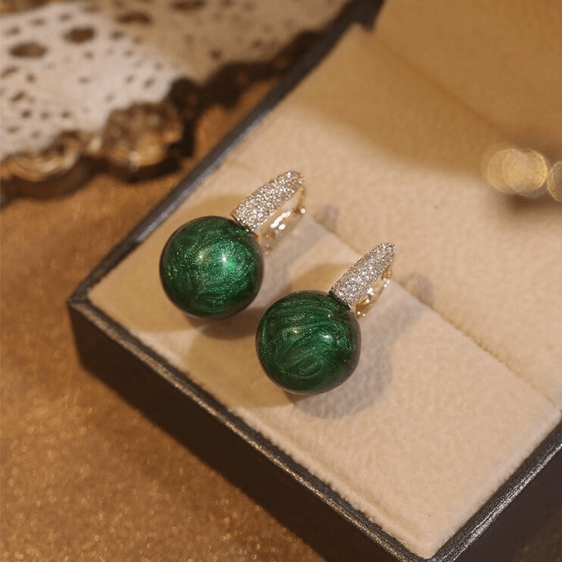 Earrings made of emerald pearls