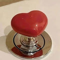 2+2 | Heart-shaped toilet flush button