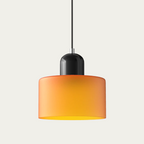 Glass light in subtle colors of the kitchen