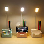 Desk lamp with phone holder