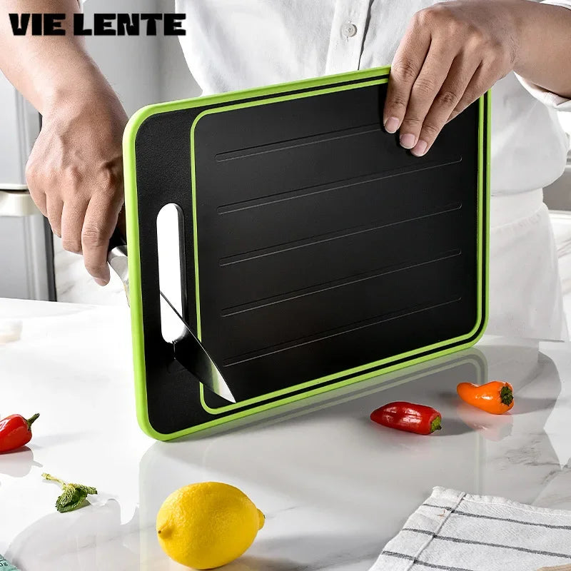 Double-sided cutting board with integrated defrosting plate
