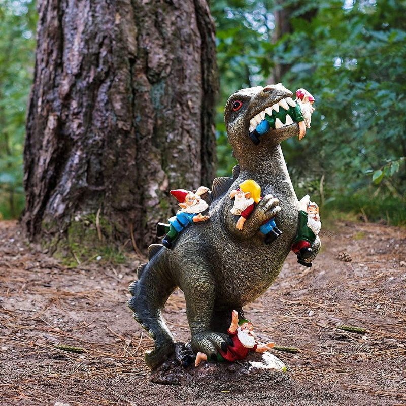 Dinosaur, the dwarf eats Ornament